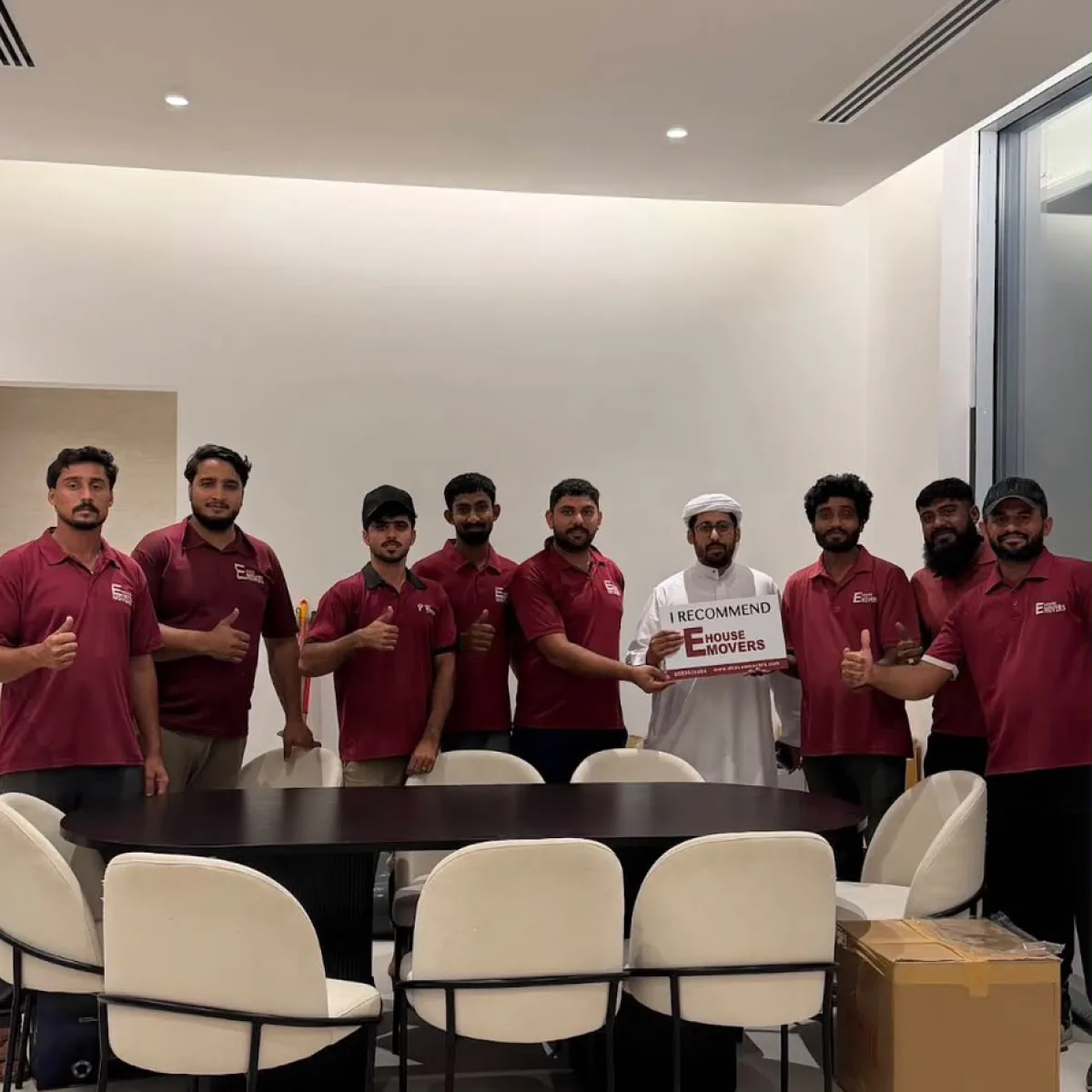 E House Movers crew in a newly set up office