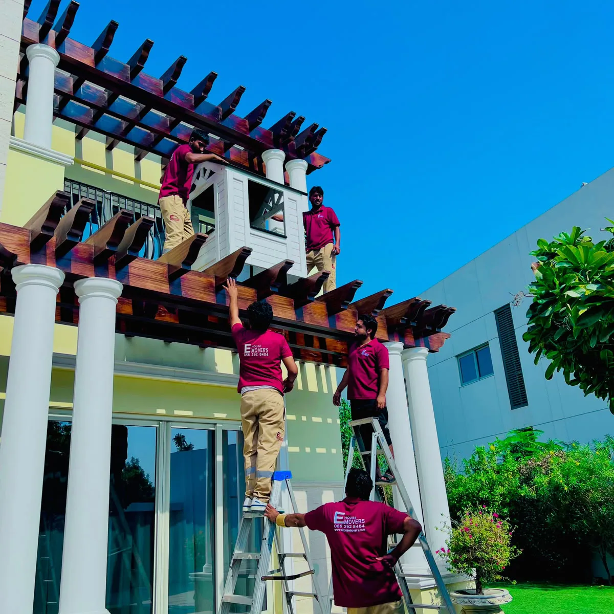 E House Movers crew working at a villa in Dubai