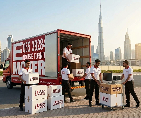 E House Movers crew handling flight cases during a media agency office relocation in Dubai